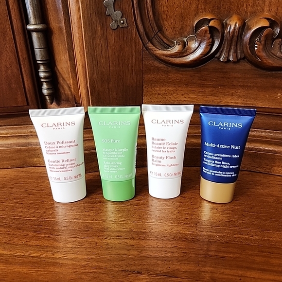 Clarins Other - Clarins 4 Piece Travel Set--NEW